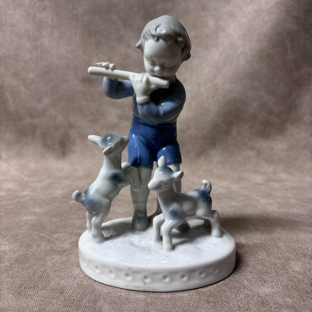 Gerald Porcelain boy playing flute figurine